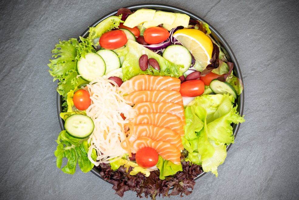 Delicious salad with salmon on the menu of proper nutrition for losing weight. 